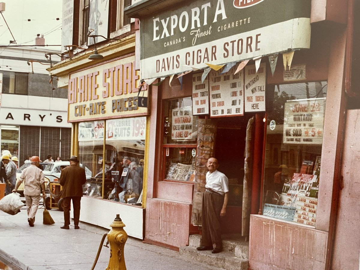 Davis Cigar Store, located at 348 Bathurst St. just north of Dundas St. W.  taken in 1978 by a member of the Davis family. Today, the north-west corner  of Bathurst and Dundas