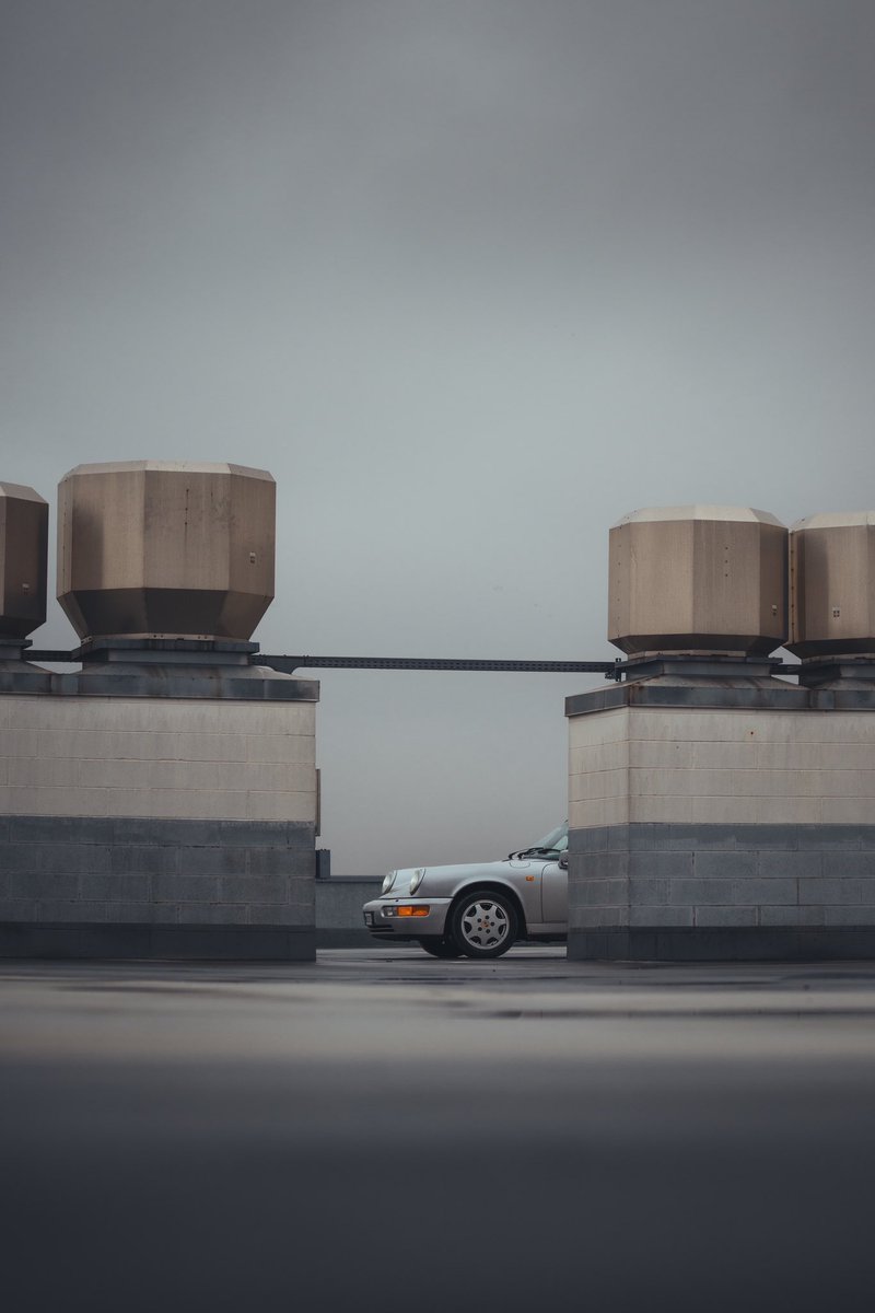 NikkoDime's tweet photo. There’s a reason why car parks are a fan favourite when it comes to car photography locations #porsche911 https://t.co/m0LQDm9lQC