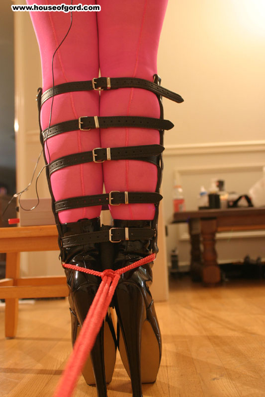 Everything is ready, all she needs now is a yank upwards on the wrist connection and tie it off.  She is ready to power up.  houseofgord.com/d/more-of-clai…    #houseofgord #claireadams #pinkkink #prettyinpink