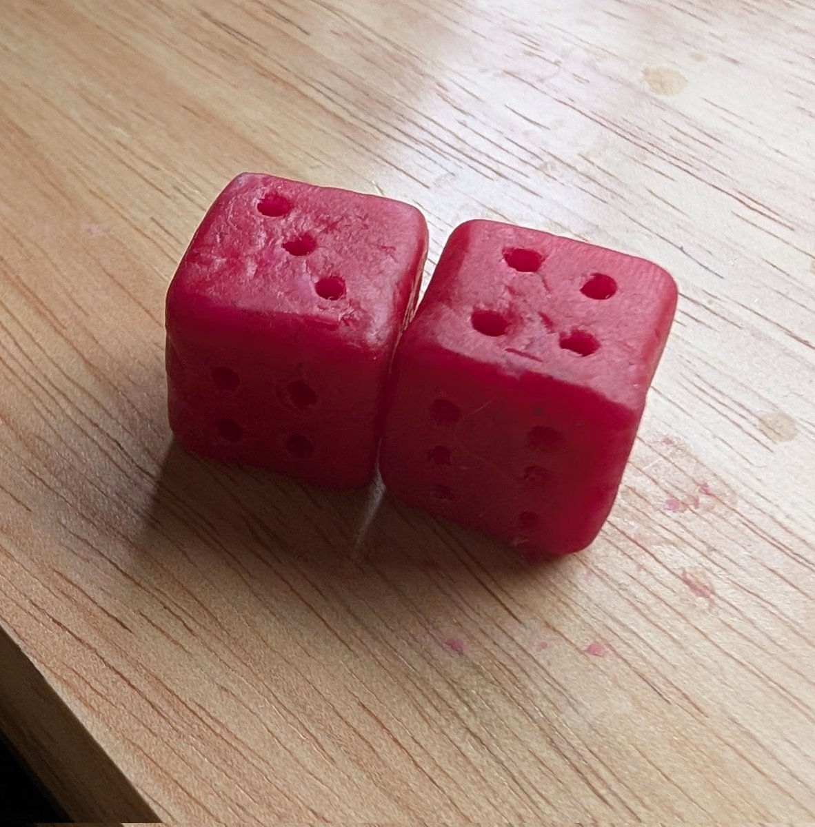 SeattleHost's tweet image. I've been using my free time to make dice out of Babybel Cheese wax 😆