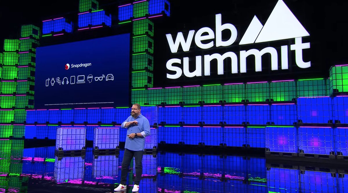 Qualcomm's tweet image. Qualcomm President and CEO @cristianoamon took center stage at #WebSummit2024 to share his vision of #AI and how we will interact with devices in the future. Watch: bit.ly/3Z2moxr