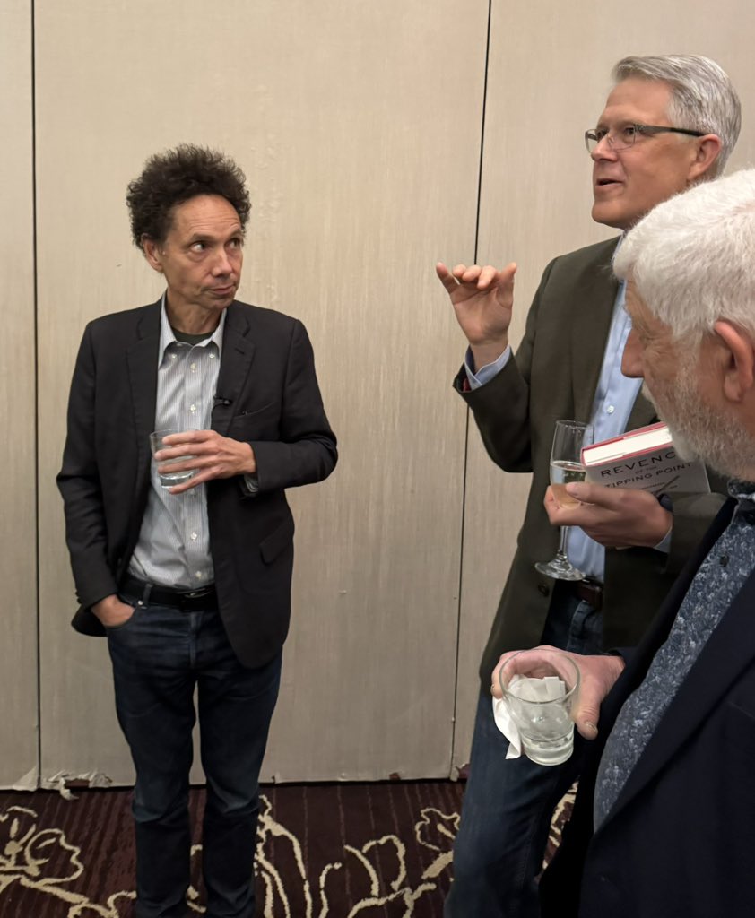 Great meeting <a href="/Gladwell/">Malcolm Gladwell</a> tonight with my wife Ada <a href="/ProBalanceTV/">Dr. Ada Wells DPT</a> at a <a href="/WACHouston/">World Affairs Council of Greater Houston</a> event. Truly a curious and genuine person. I look forward to checking out Malcolm’s book and podcast! (Btw, I don’t think Malcolm was buying my story. 😆🤗) podcasts.apple.com/us/podcast/the…