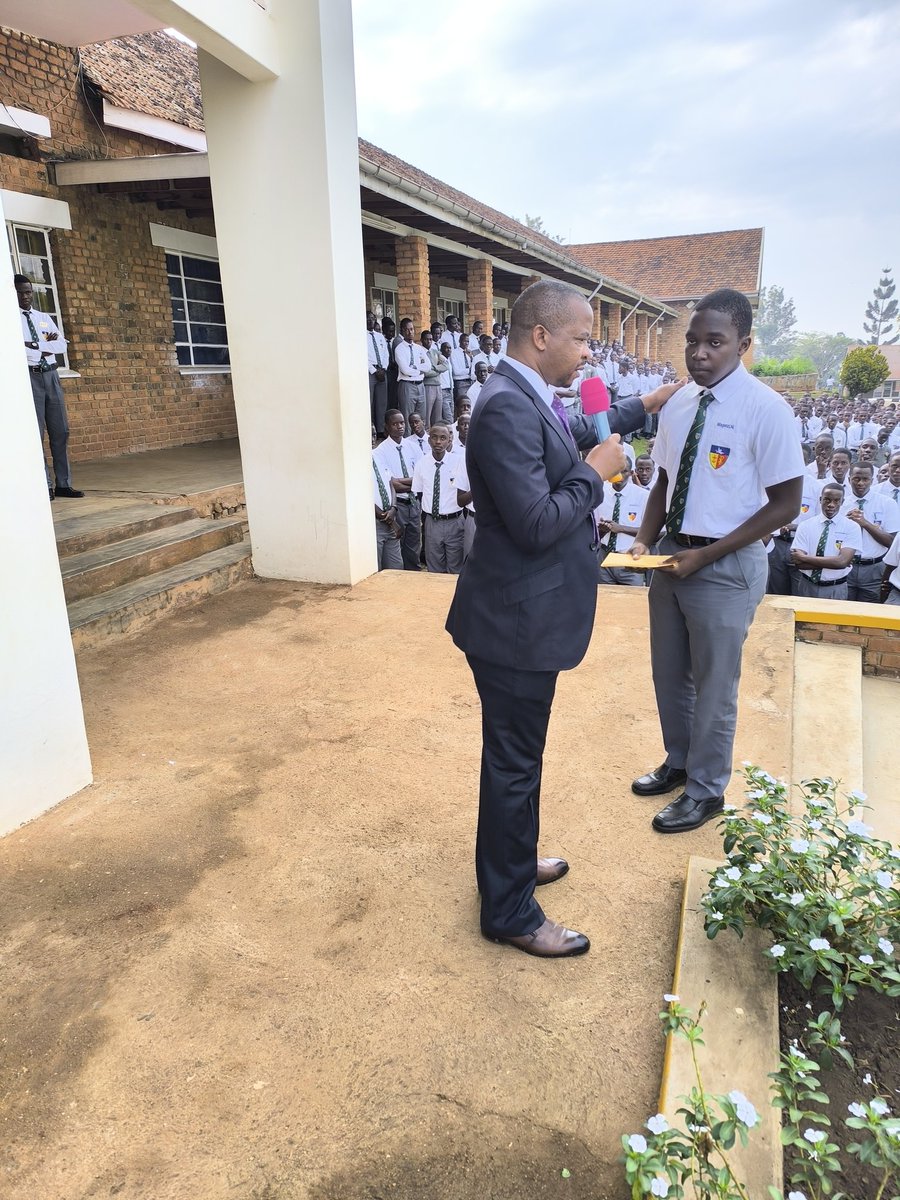 After losing a parent, a boy found solace in the heartfelt condolences and support from his fellow students at Namilyango College. The Deputy Headteacher handed him an envelope. Together, they stood strong.