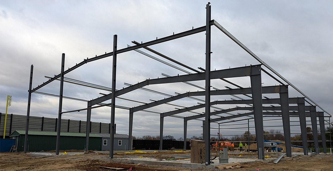 BhdgInc's tweet photo. Construction Update: Concrete has been poured and framing is going up at the John A Logan College Harrison Bruce Player Development Center! This is a state-of-the-art indoor baseball and softball facility that will house a hitting lab, pitching lab and locker rooms. #JALC #VOLS https://t.co/F4Cwg4WxBa