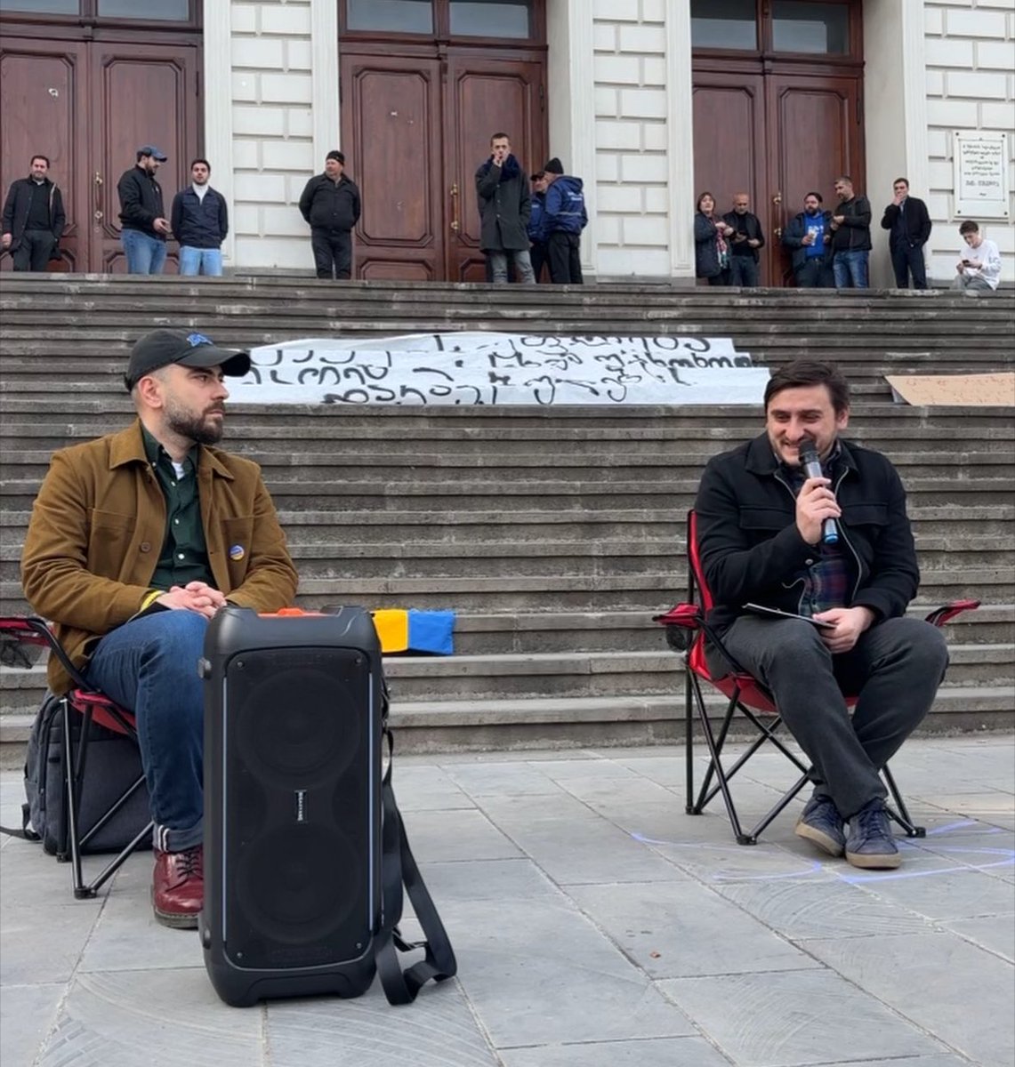 .<a href="/SovLab/">SovLab</a> is currently holding a protest lecture outside of the Tbilisi State University where students are camped out. The topic is the Holodomor: the genocide of the Ukrainian people.
Speakers are Irakli Khvadagiani (right) and <a href="/kandelakigiorgi/">Giorgi Kandelaki</a> (left).
#GeorgiaProtests