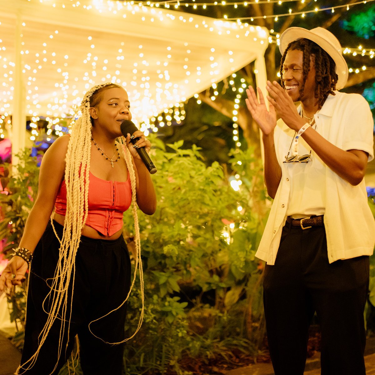 scriptsandbars's tweet image. As part of the Scripts and Bars showcase at ACCES 2024 in Kigali, Banshee and Indigo Saint performed at a welcome ceremony for Alison Thorpe, the incoming British High Commissioner to Rwanda. This experience elevated their profiles and helped them connect with new audiences.