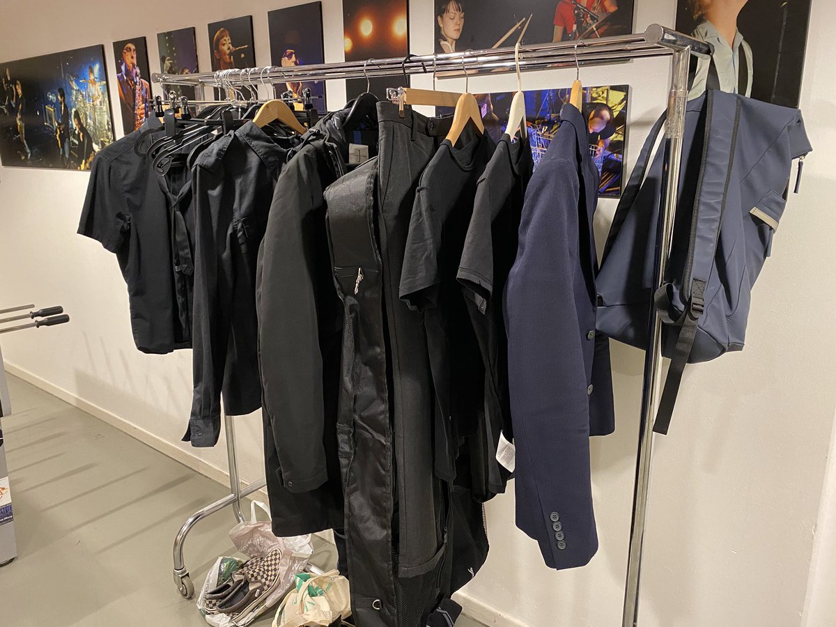 Panic backstage as someone introduces a navy garment to the stage clothes rack!
