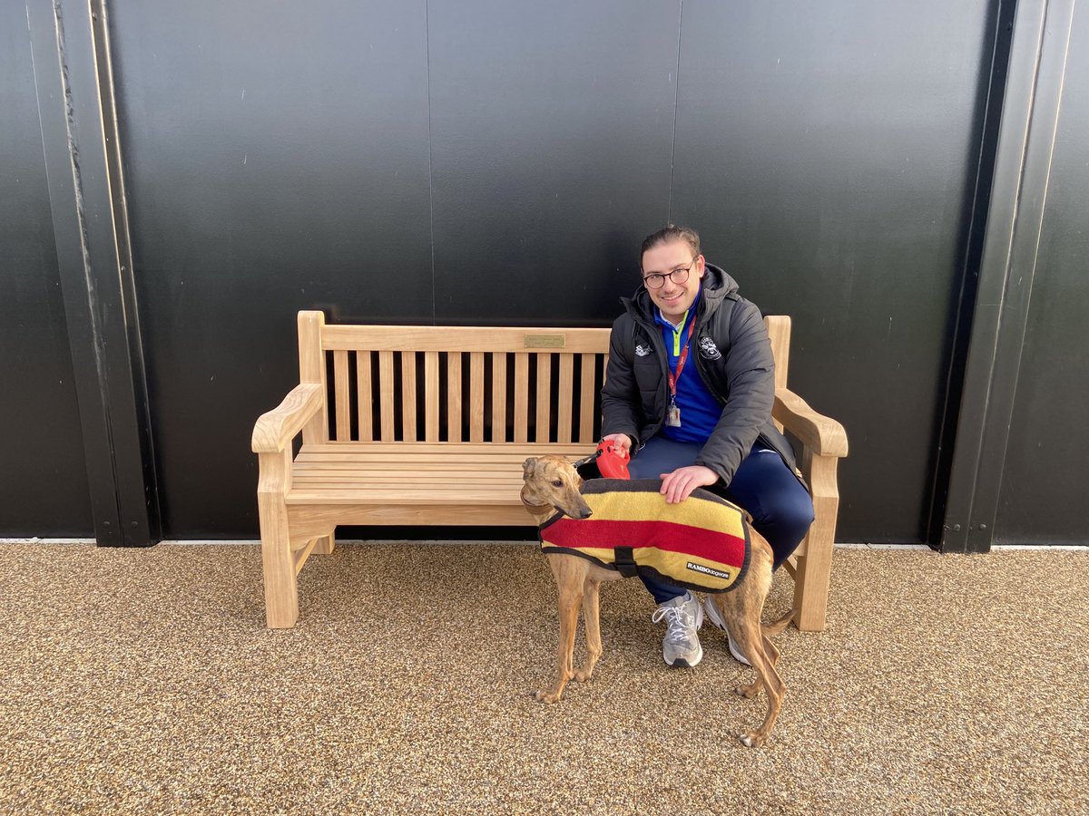 TheCaulfieldWay's tweet photo. This is ⁦@BenLeanse⁩ who a year ago could not go near a dog, let alone touch one.  A year later, he sits down with Paisley after a little walk, lovely.
And he got to “open” the new academy “offices” too. There you go 🐝 https://t.co/vUBLaDoga7