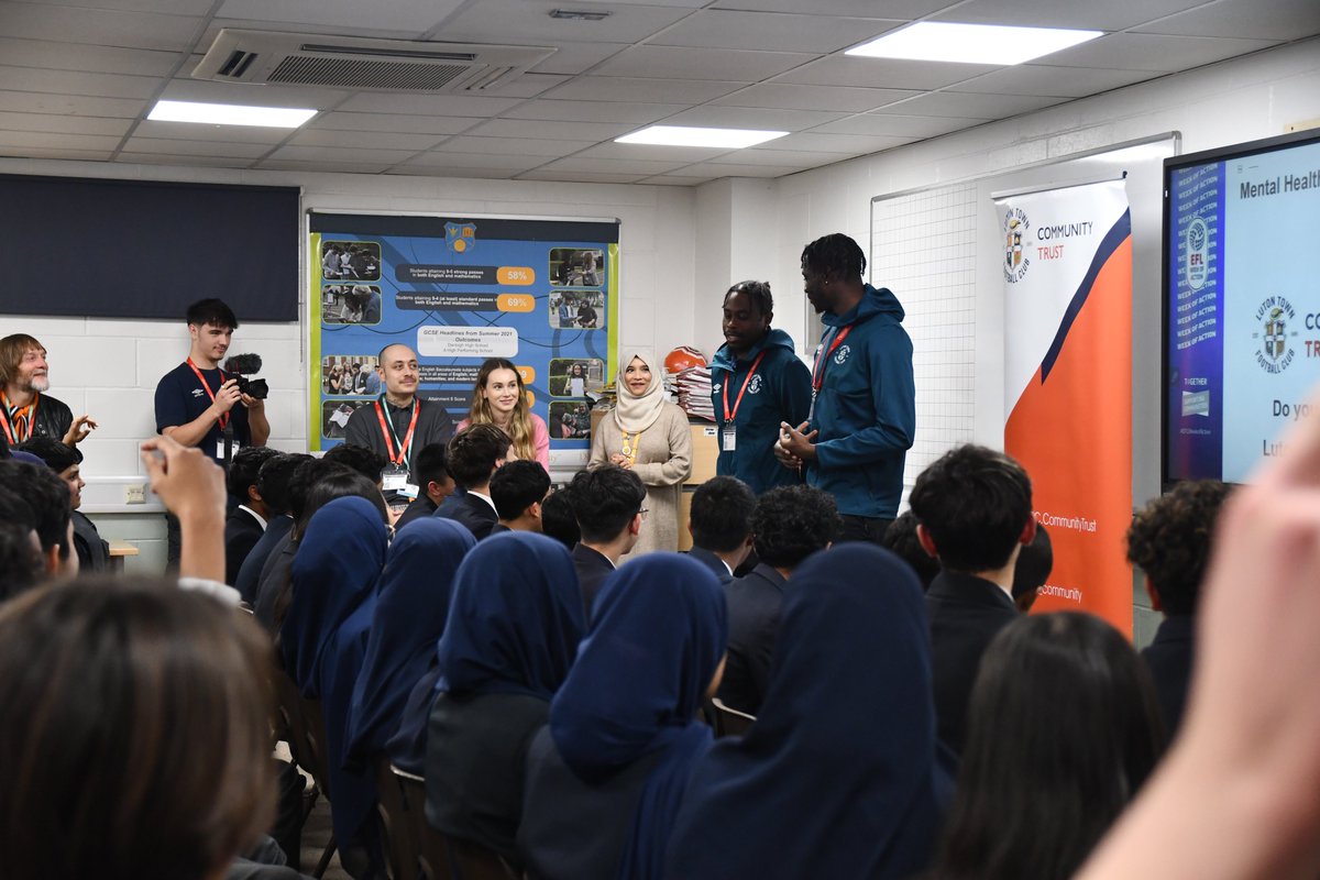 DenbighHigh's tweet photo. This week, we were delighted to host @LutonTown and @chumscharity, who joined forces for a special mental health awareness assembly. Luton Town FC stars @Mickharford, @EliSaint4, and @PellyRuddock  shared their personal experiences and answered questions from pupils. https://t.co/rMnz8s74Ir