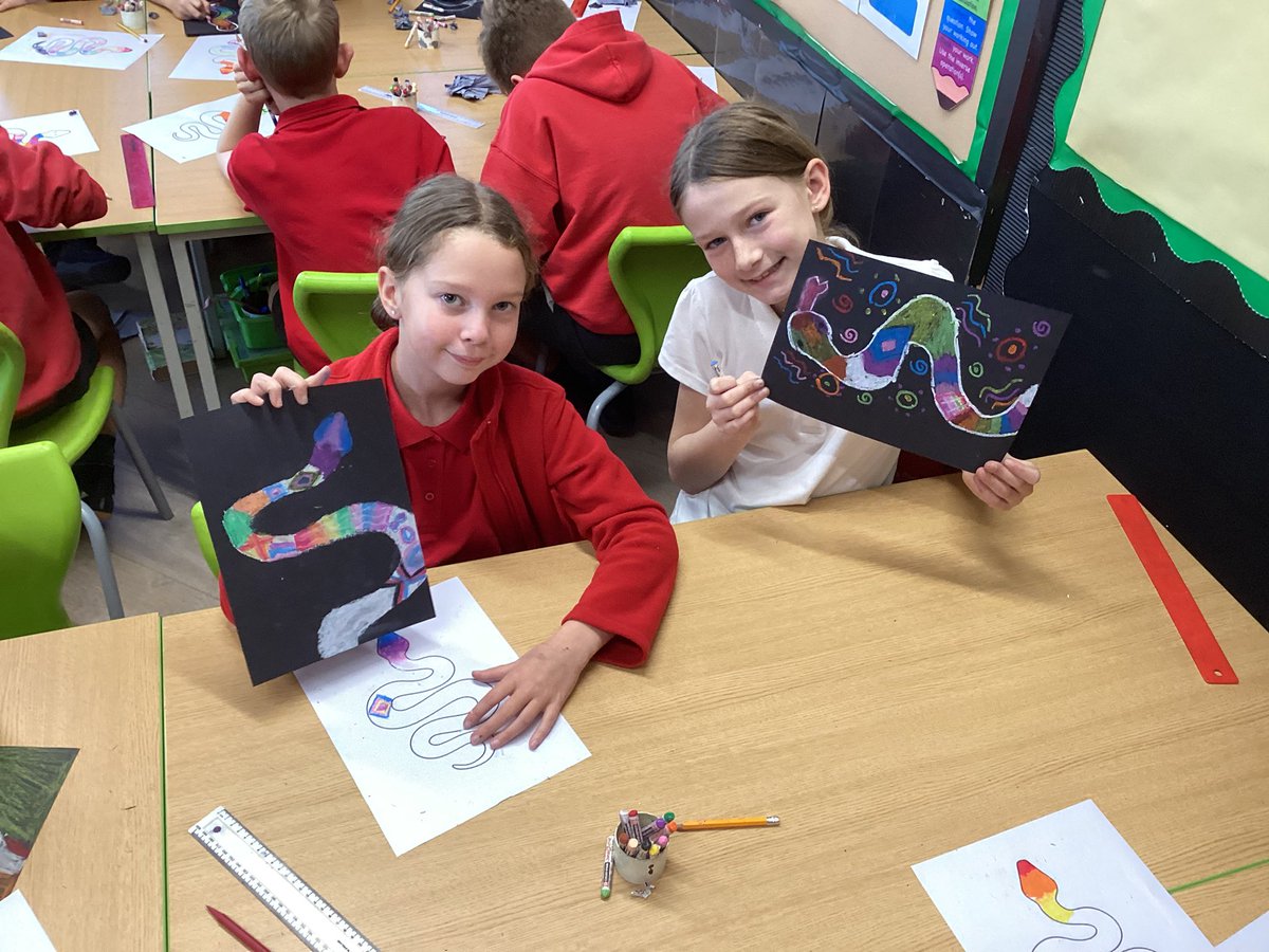PPSMrsGooding's tweet photo. Pupils have been learning about Dreamtime Aboriginal stories and have designed beautiful ‘Rainbow Serpents,’ using traditional patterns, symbols and designs. 😃@PentrepoethPrim https://t.co/HAJ1jGfbvG