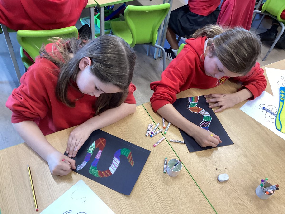 PPSMrsGooding's tweet photo. Pupils have been learning about Dreamtime Aboriginal stories and have designed beautiful ‘Rainbow Serpents,’ using traditional patterns, symbols and designs. 😃@PentrepoethPrim https://t.co/HAJ1jGfbvG