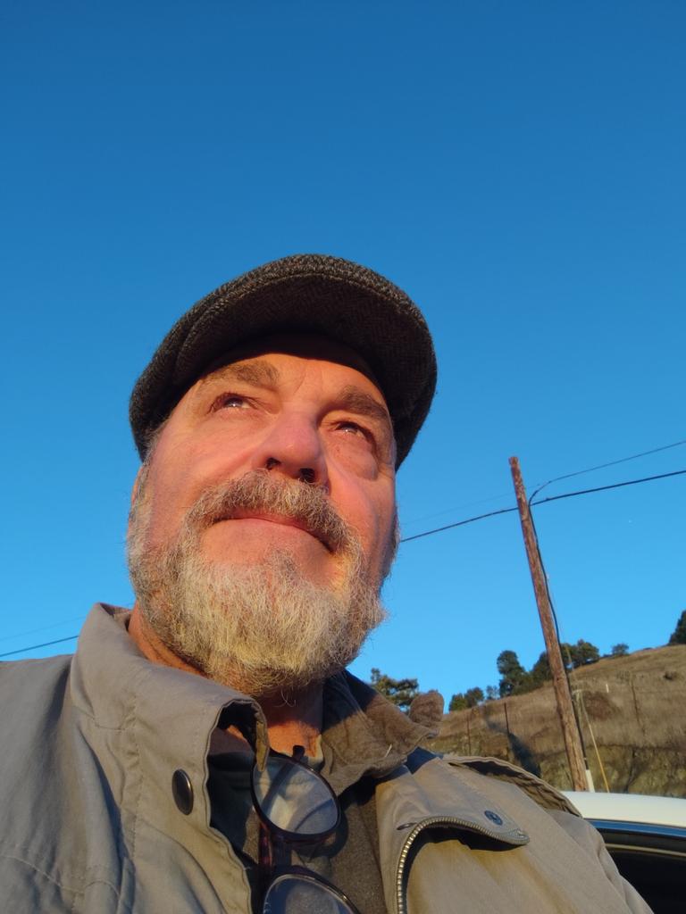 This is a picture of me this morning. I was trying to capture the beaver supermoon at Big Rock. Unfortunately I was too late but caught the sunrise.