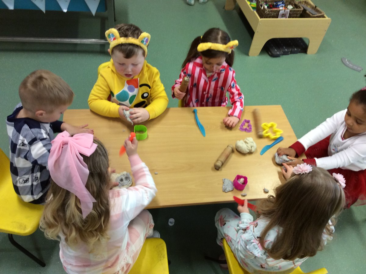 OverfieldsPri's tweet image. Nursery dressed in their pyjamas and Pudsy T-shirts for Children In Need.  We enjoyed making a bear biscuit, collaging a Pudsey bear and cutting out play dough bears. Thank you for your kind donations.