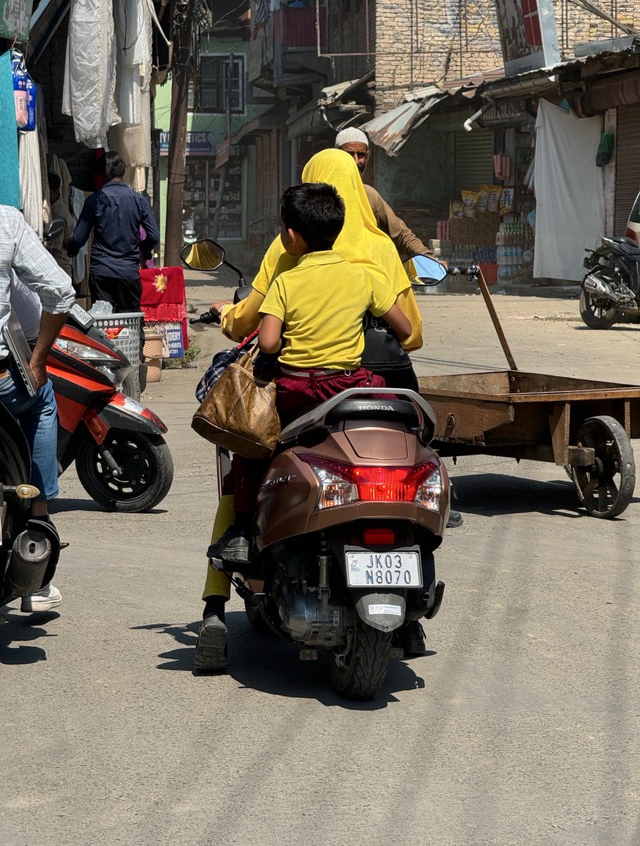 OmerKochak's tweet photo. Minors riding two wheelers is a grave concern. It starts from this and ends in sorrow. @traffic_hqrs @igtraffic_jk @JmuKmrPolice @JKTransportDept https://t.co/WiYYgy0I3J