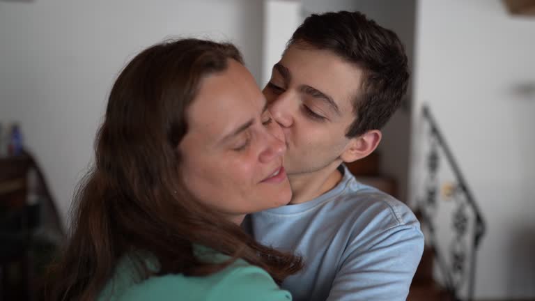 GwaalaRitz's tweet photo. How sons hug, kiss &amp; play with their mums vs how @GwaalaRitz does it with his mummy @LailaRo06809515.

I cant help it but swap between  @LailaRo06809515 's 🕳. Such warmth and  mo ther ly  feeling. 🖤 https://t.co/72iNhO0U72