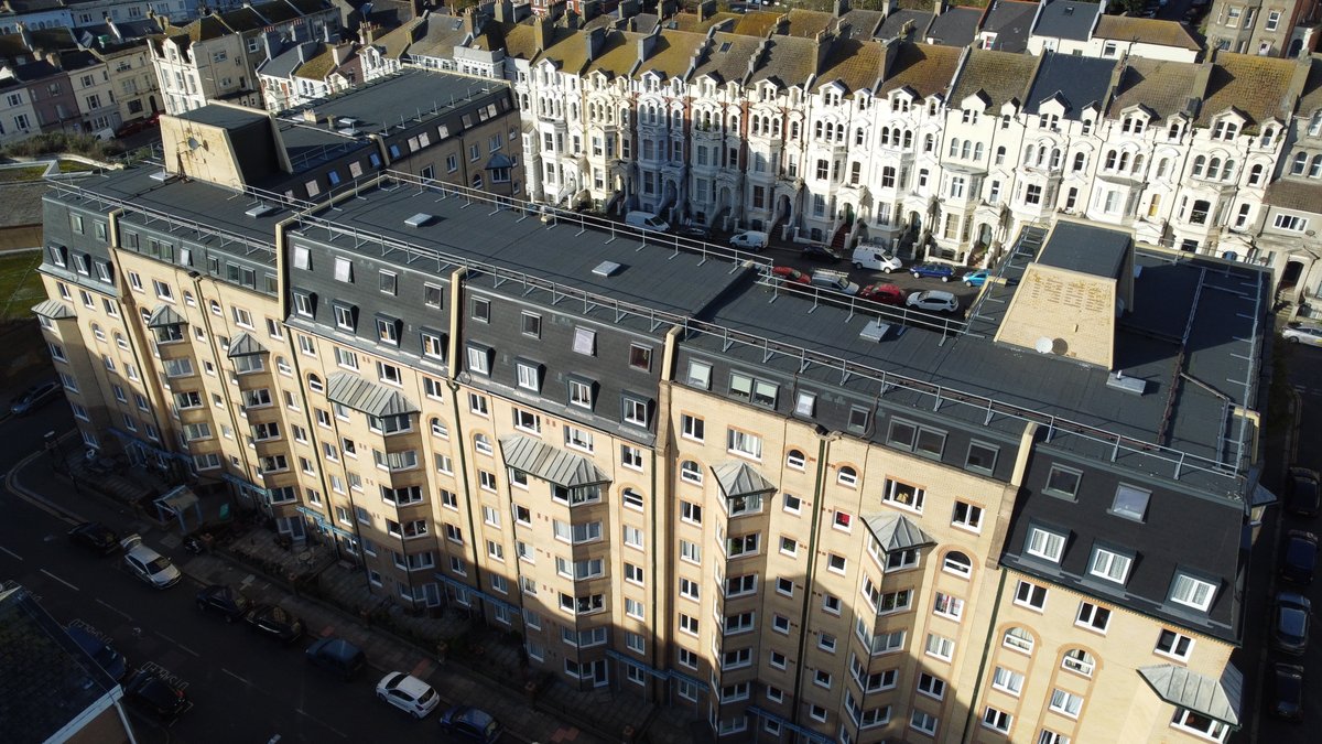 Check out awesome drone photos showcasing façade remediation works successfully completed at Royal Terrace, Hastings for <a href="/EQUANS_UK/">Equans UK & Ireland</a>.

Our comprehensive scope included replacing the traditional timber mansard with a fully non-combustible façade build-up.

#facade #firesafety