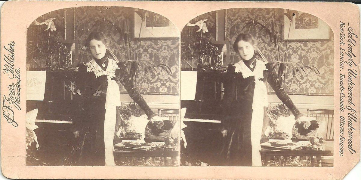 Early photo of Edna May by JF Jarvis, Washington DC , circa 1900, with piano, wallpaper and beautiful locket.