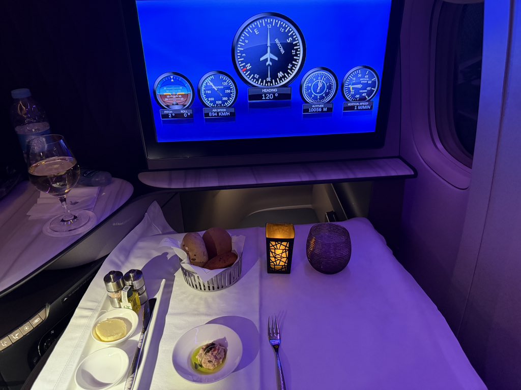 Hello from onboard A7-BAO a Qatar Airways Boeing 777-300ER enroute from AMS-DOH My first time flying the Q Suites Business Class, very impressive indeed!