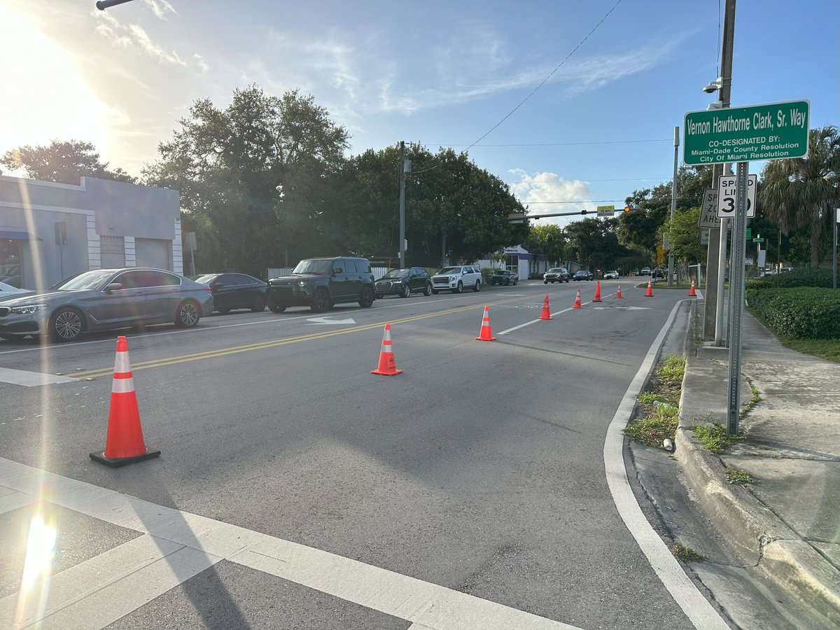 The utterly superfluous (there's no connecting lane to it) dedicated right turn lane was also closed off, thus providing a PROPER setback from the sidewalk for families from 37th Ave. traffic.