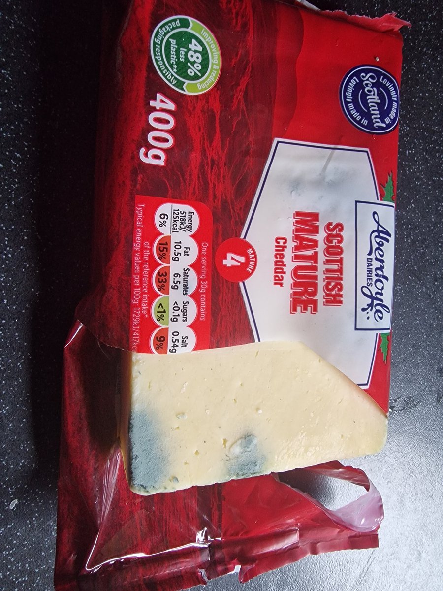 ashley_kivlin's tweet photo. @LidlGB I bought this cheese yesterday and when I went to use it today this was the result. The date on the packet, as you can see, is 13th December. There is no way this cheese should have been in this state. https://t.co/60gRnX5XaR