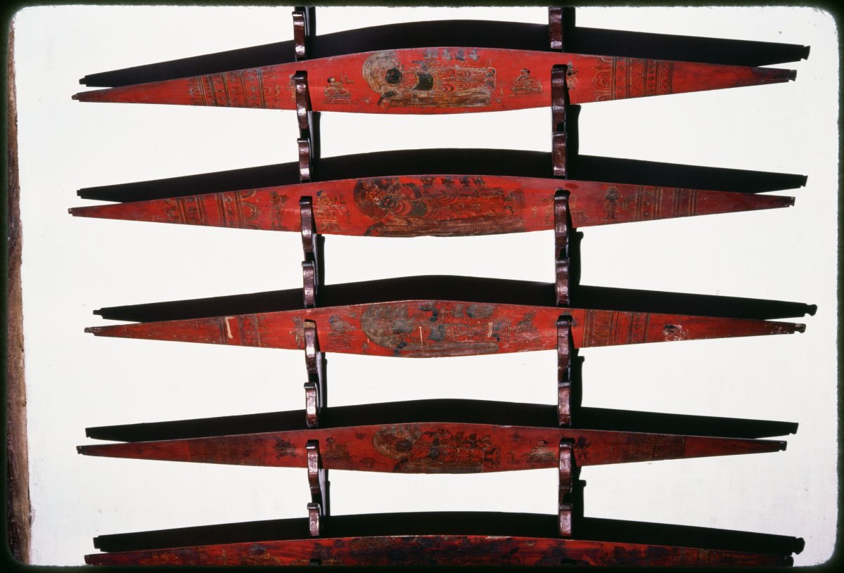iconographile's tweet photo. Onavillu, ceremonial bows, Padmanabhapuram Palace, Kerala, India. Usually a rack holds six designs, with Vishnu reclining on snake Anantha being the longest &amp; widest, but this rack has only one. Traditional colors: B&amp;W, red, yellow, and blue are used.  #stuartcarywelch  @Harvard https://t.co/2xXXk8hyKo