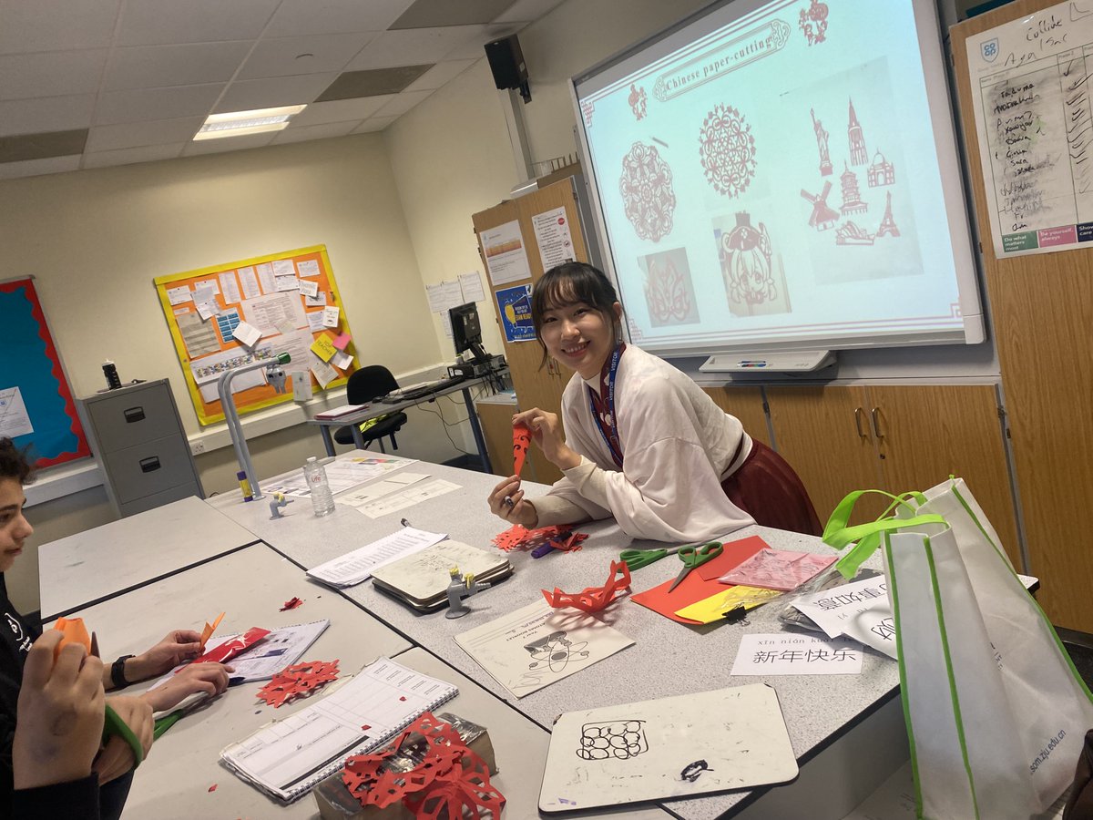 LeedsConfucius's tweet photo. @CoopLeeds students got creative for #LeedsLanguageWeek with a fun Chinese New Year workshop hosted by the Business Confucius Institute! They learned about traditions, tried Mandarin greetings, and made paper cuts for good luck! 🧧📷 #ChineseNewYear #CulturalExchange https://t.co/BdlYGJgfYG