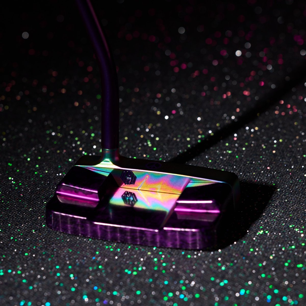 BettinardiGolf's tweet photo. Catch the good vibes with our #PutterOfTheWeek! ✌️✨ This INOVAI 10.0 is a true groovy masterpiece with its Peace Eyes Wizard, purple anodized body, and Tie-Dye PVD face featuring a peace sign alignment. Ready to add some peace, love, and birdies to your game? 🌈
#Bettinardi https://t.co/RU4cnTJKJx