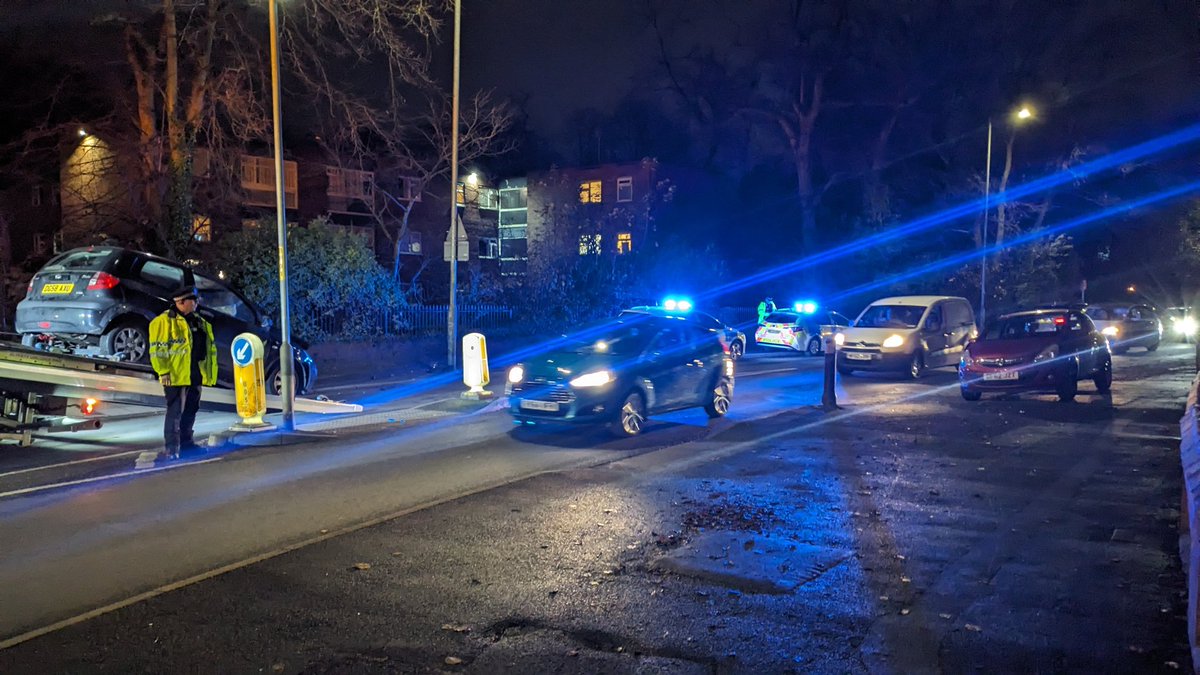Another accident on Slade Lane just by the Old Hall Lane junction

Don't know what happened. Looks like one car was involved

Its bumper and other debris was by a street light so it may have hit it
