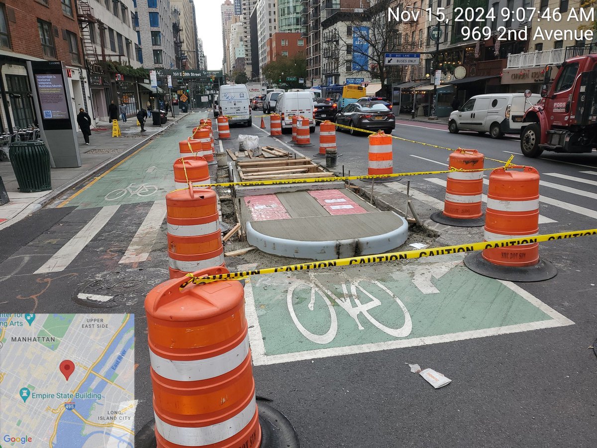 Reasmus2's tweet photo. When it rains, it pours! Improvements are underway for the refurbished section of the 2nd Avenue protected #bikeNYC lane south of 57th Street. @NYC_DOT is adding concrete-protected pedestrian islands at several locations. 📸  of ongoing work at 51st and 49th Streets. 🤩 https://t.co/5j4aTrEAQB