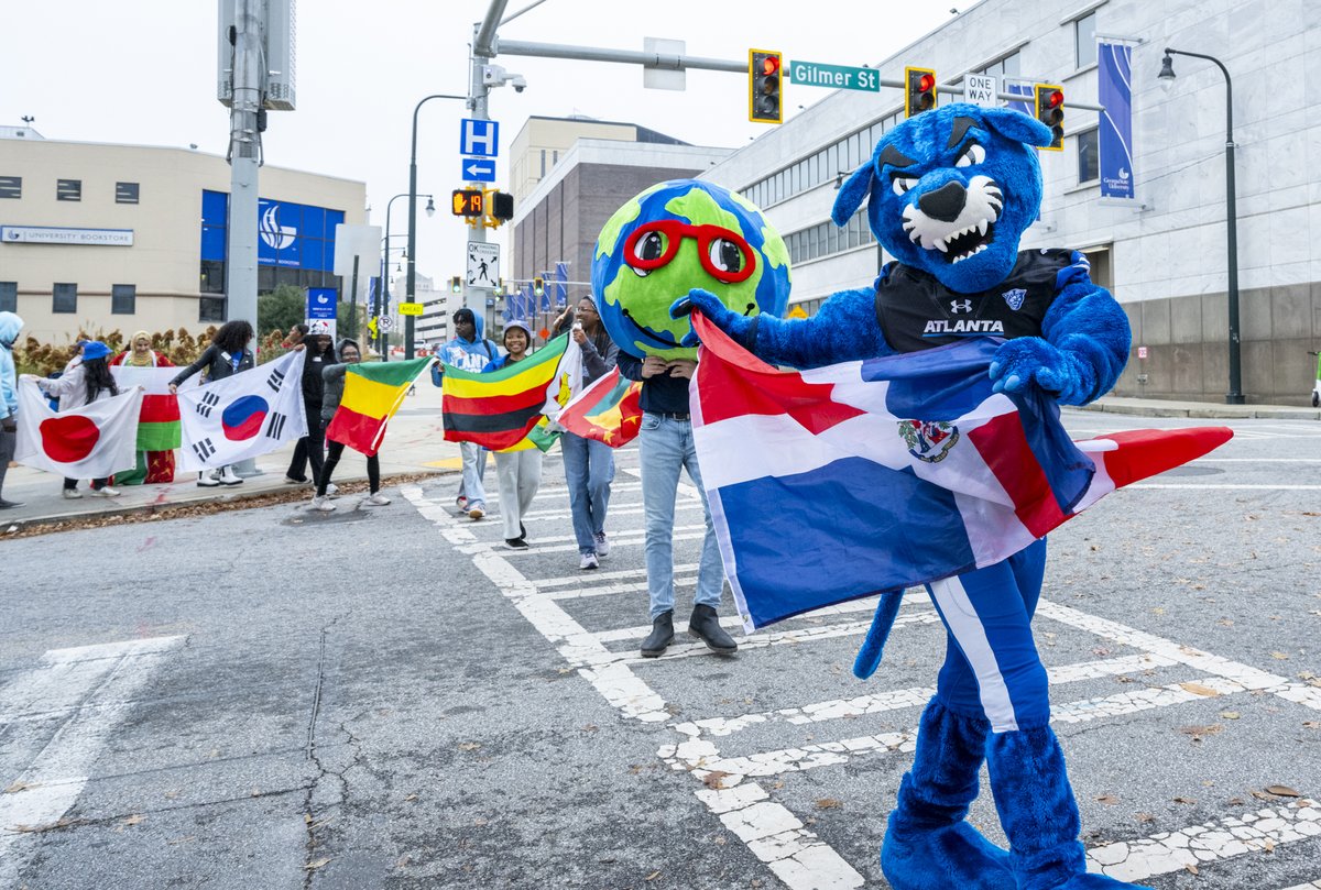 GeorgiaStateU's tweet photo. Yesterday we celebrated Georgia State Universityโs 25th anniversary of International Education Week with a GLOBAL HOMECOMING! Students were able to attend a career expo as well as the Flag Parade, where they showcase their nation's flag. #OneGeorgiaState #TheStateWay https://t.co/ADU8Un3Oph