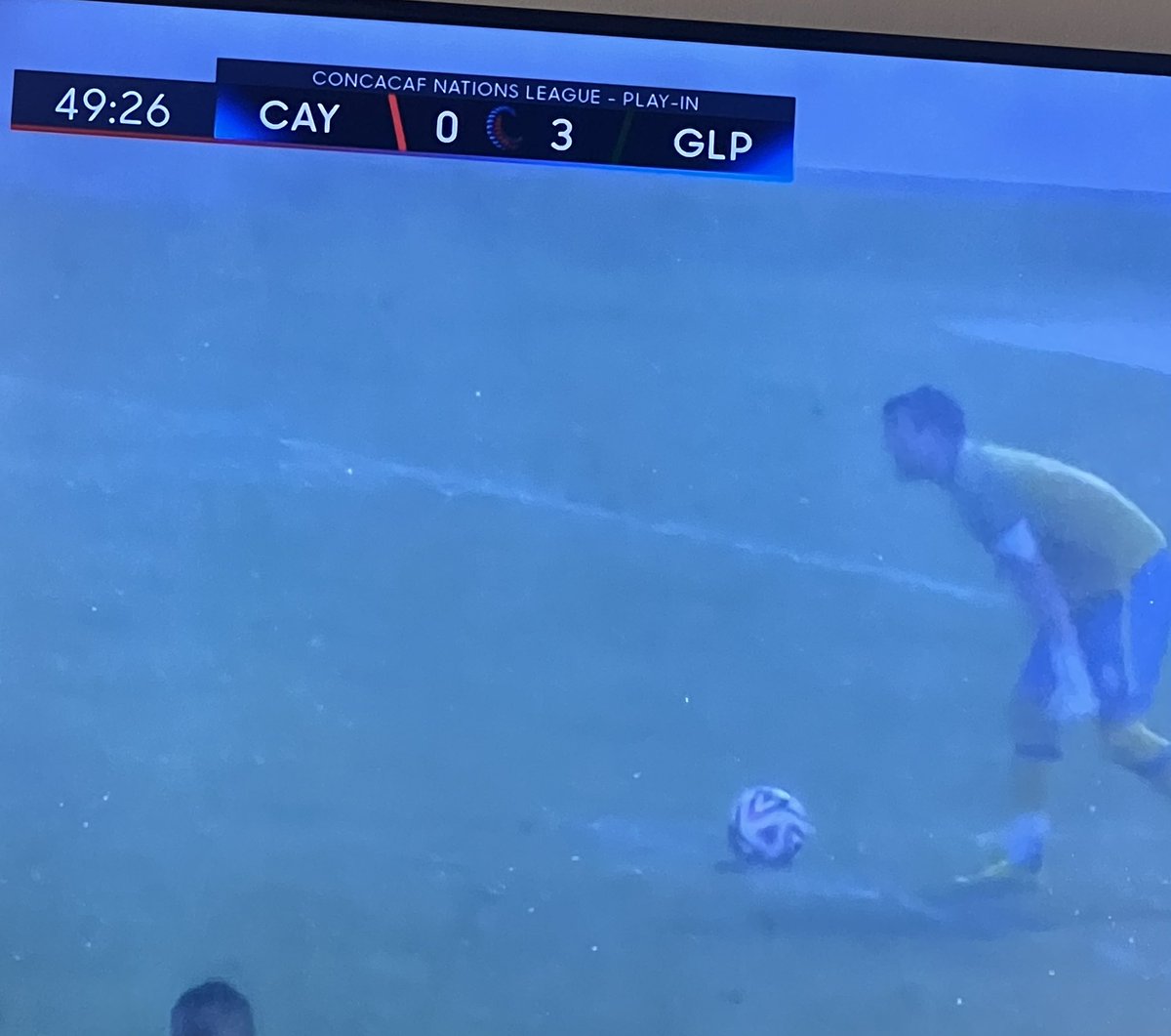 PrinceofPicks10's tweet photo. Guadeloupe &amp; Cayman Islands are playing in a damn hurricane lol….

Outdoor Futbol in the fall is something else 👀 

Any shot on target should be a goal, idk how the keeper is supposed to see the ball coming https://t.co/U7UxRe2sNT
