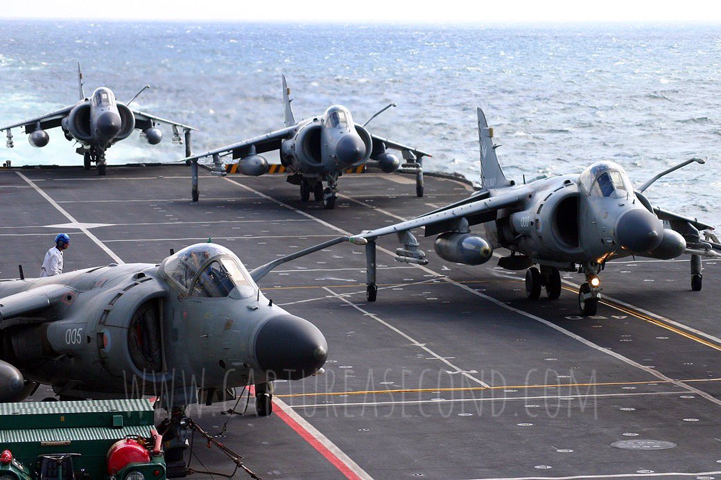 Lined up to launch from HMS Illustrious, 2005. Welcome to another #harrierfriday ✈️#royalnavy #shar #seaharrier #hmsillustrious #harrier #jfh #hover #airpower #fighter #flight #fastjet #aviation #avgeek #captureasecond