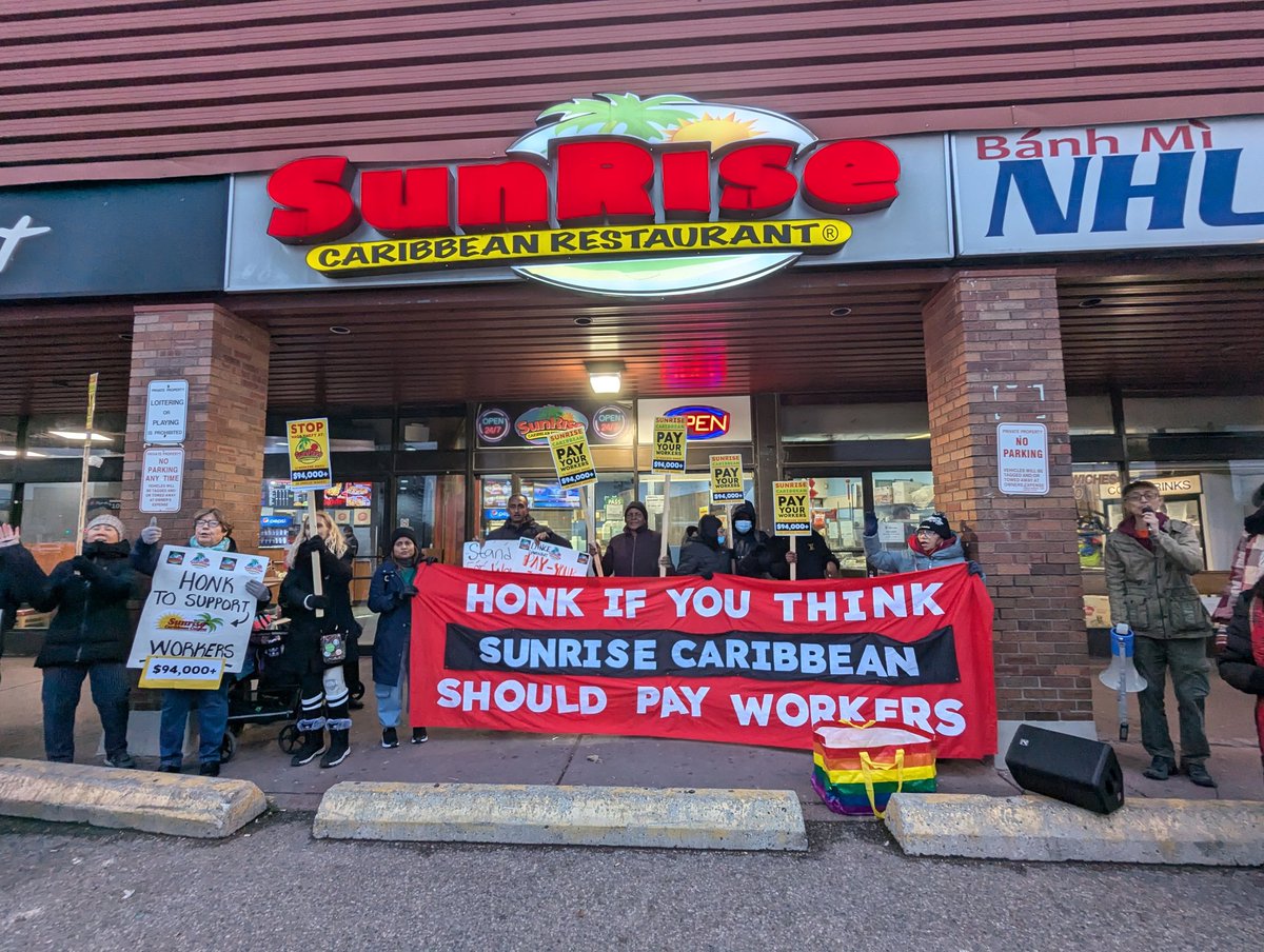 WorkersAC's tweet photo. The Workers Action Centre, @JFAAP and workers of Sunrise Caribbean Restaurant are here today demanding Sunrise CEO Lance Davenport pay their workers $94,000 in unpaid wages. 

 @SunriseCaribbe1 https://t.co/hHu0bpgqj1