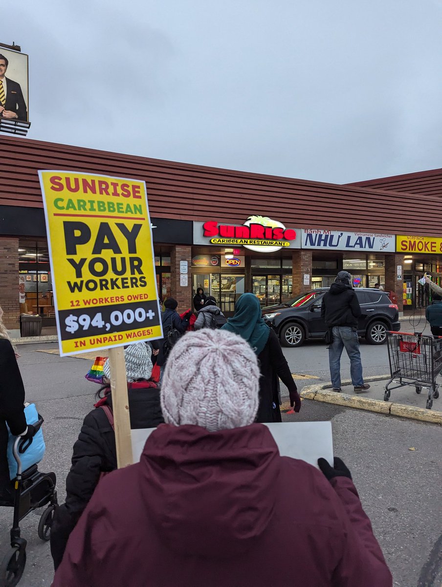 WorkersAC's tweet photo. The Workers Action Centre, @JFAAP and workers of Sunrise Caribbean Restaurant are here today demanding Sunrise CEO Lance Davenport pay their workers $94,000 in unpaid wages. 

 @SunriseCaribbe1 https://t.co/hHu0bpgqj1