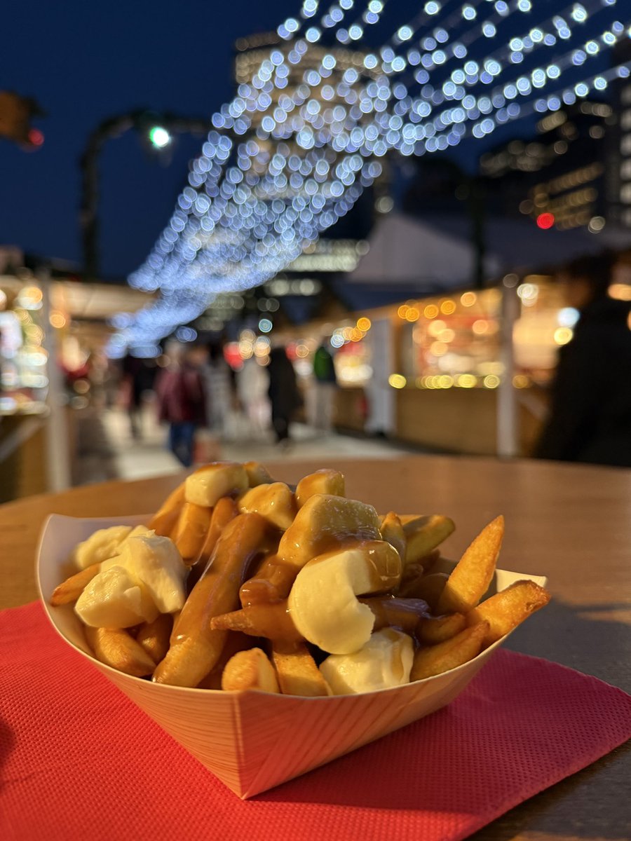 Canadian friends, this is my first poutine - I got this at a Paris Christmas market and it was tasty, but I’m curious… does this look like legit, ‘proper’ poutine? 

The cheesy bits were room temperature, apart from some right in the middle that got melty from the heat