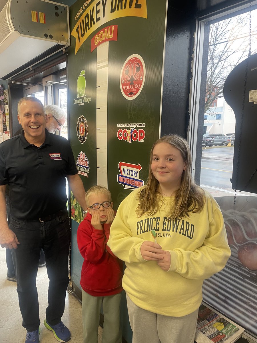 Thank you ⁦<a href="/Fton_Chamber/">Fredericton Chamber</a>⁩ Morgan Peters and kids for your generous donation to the ⁦<a href="/MeatVictory/">Victory Meat & Produce Market</a>⁩ Community Grocers Turkey Drive to support ⁦<a href="/Greener_Village/">Greener Village</a>⁩.  This will help people in need have a more enjoyable holiday season. Sully’s scary face is working!!