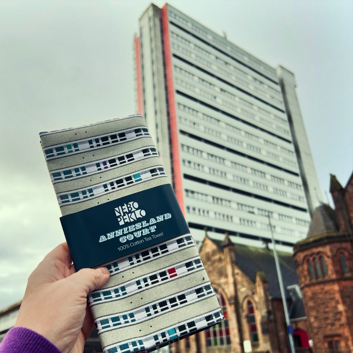 Anniesland Court tea towel in its natural environment. I did get funny looks from the Costa windows taking this photo. Available online or in person at the Dandelion Cafe Christmas market on 28th Nov &amp; <a href="/TeaGreenEvents/">TeaGreenEvents</a> at Kelvingrove Museum on 7th/8th Dec ✨
