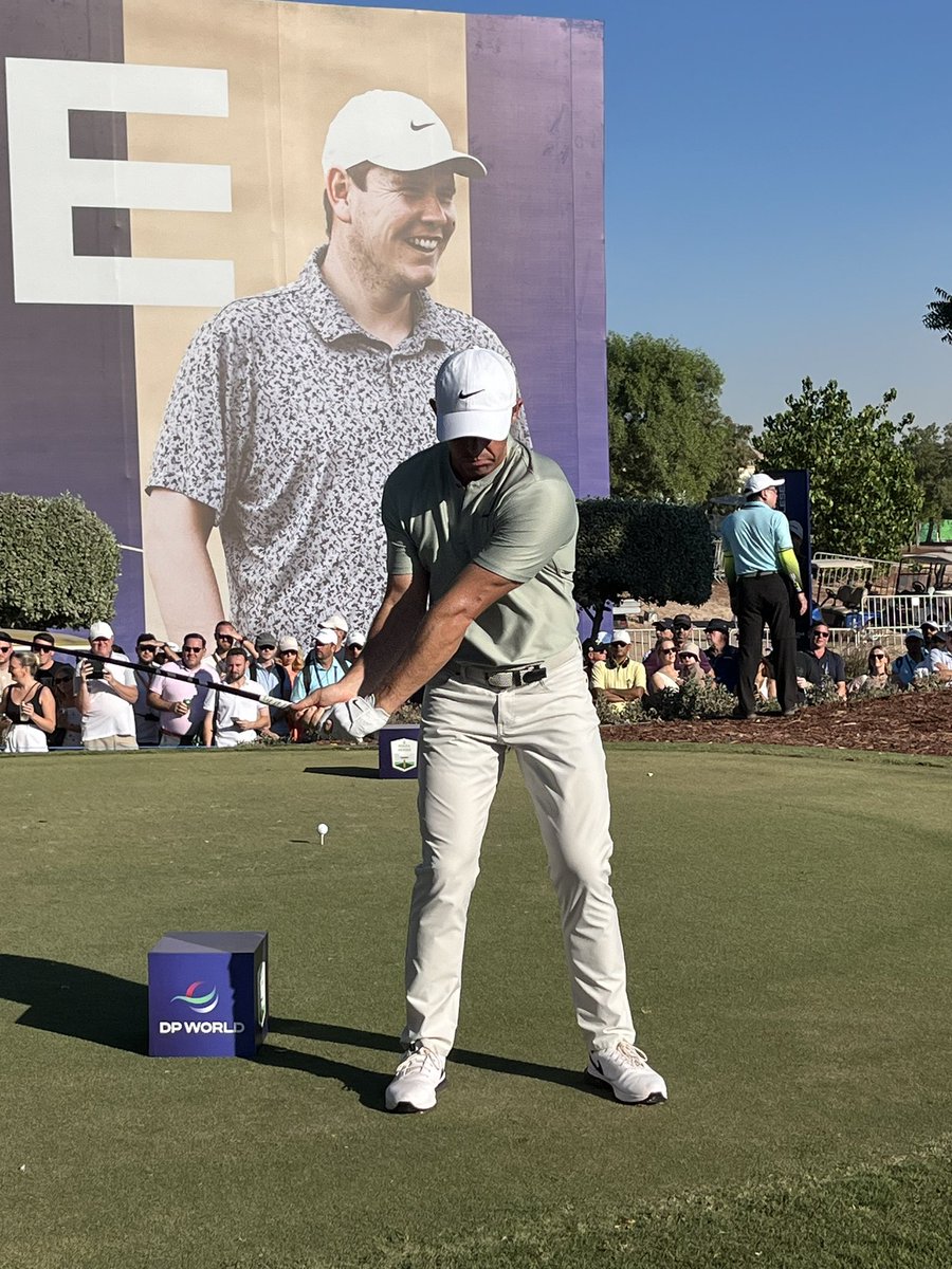 PinkTaxiRunner's tweet photo. He is playing fantastic - has been all week and I wait up at hole 14 ( against the ugliest backdrop : I crop and zoom ) @McIlroyRory #practiceswing https://t.co/DfSmPxAvpW