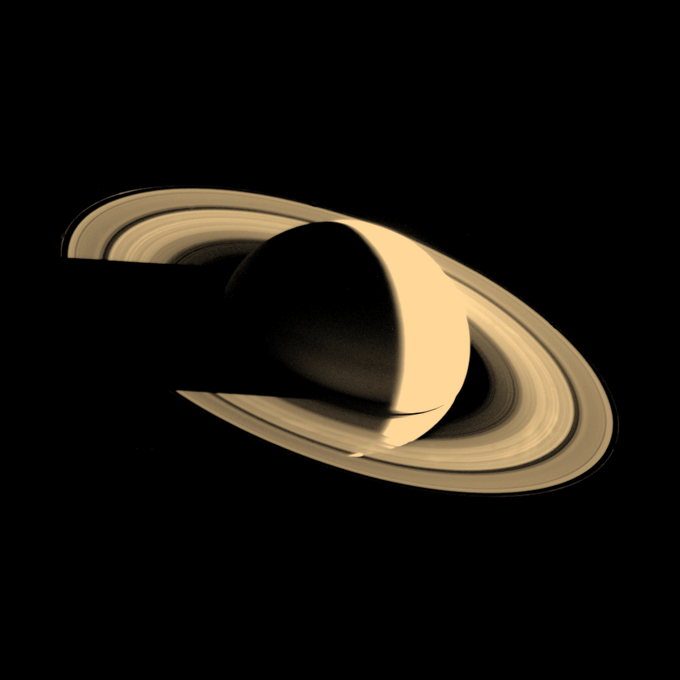 An image of Saturn highlighting its rings, set against a dark background.