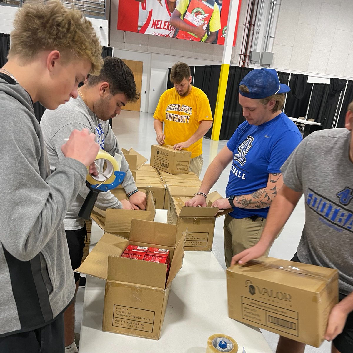This past week, the Aurora University Football team helped us prepare for Build a Shoebox Online fulfillment in our Aurora, IL processing center. Over 130 players and coaches, including former Buffalo Bills receiver Don Beebe, participated! We praise God for their hard work and