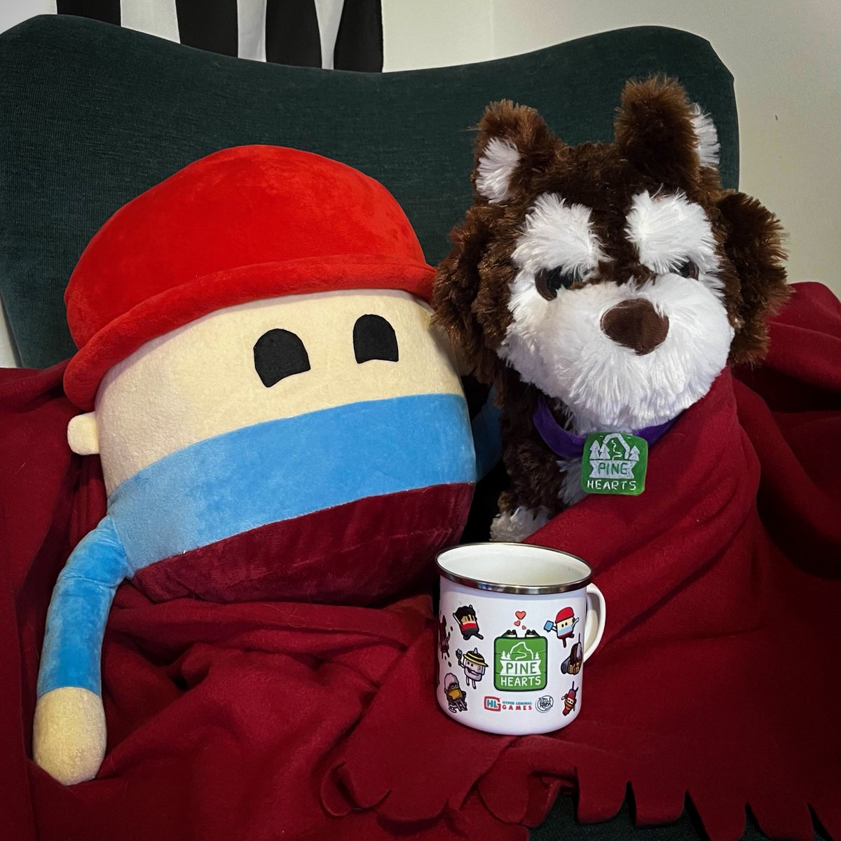 Tyke and Bonnie are all cuddled up for Self-Care Sunday with #CozyQuest! ☕💚

Tune in at 12pm today for <a href="/WeAreSecretMode/">Secret Mode | NUTMEG! + A Storied Life, coming '26</a>'s panel on the Positive Effects of Cozy Games on Mental Wellbeing ✨ Where we chat about Pine Hearts and some of our other favourite cosy games!