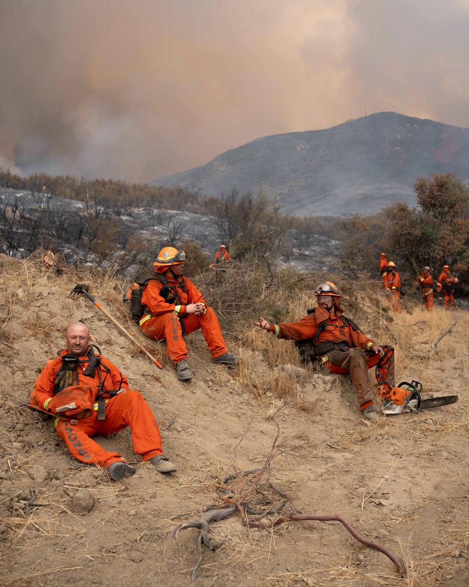 A photo I took of incarcerated firefighters resting after fighting a SoCal wildfire. They get $2-$5/day for that work. W/ Republicans likely allowing federal firefighter pay to be cut soon, many may quit, pushing California to increase its reliance on its incarcerated workforce.