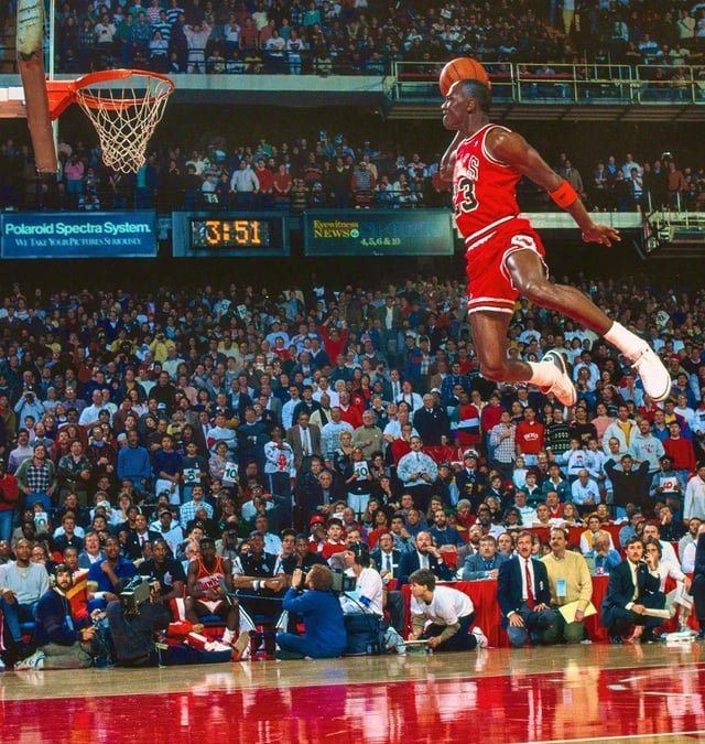 <a href="/timecaptales/">Time Capsule Tales</a> Michael Jordan jumping from the free throw line in the 1987 slam dunk contest.