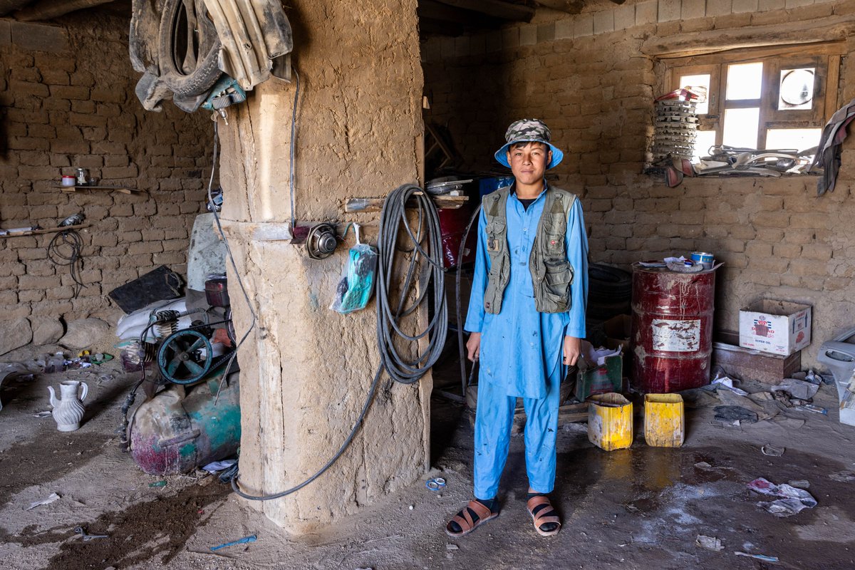 Auto repair shop in Ghujur, Jaghuri district with young apprentice.