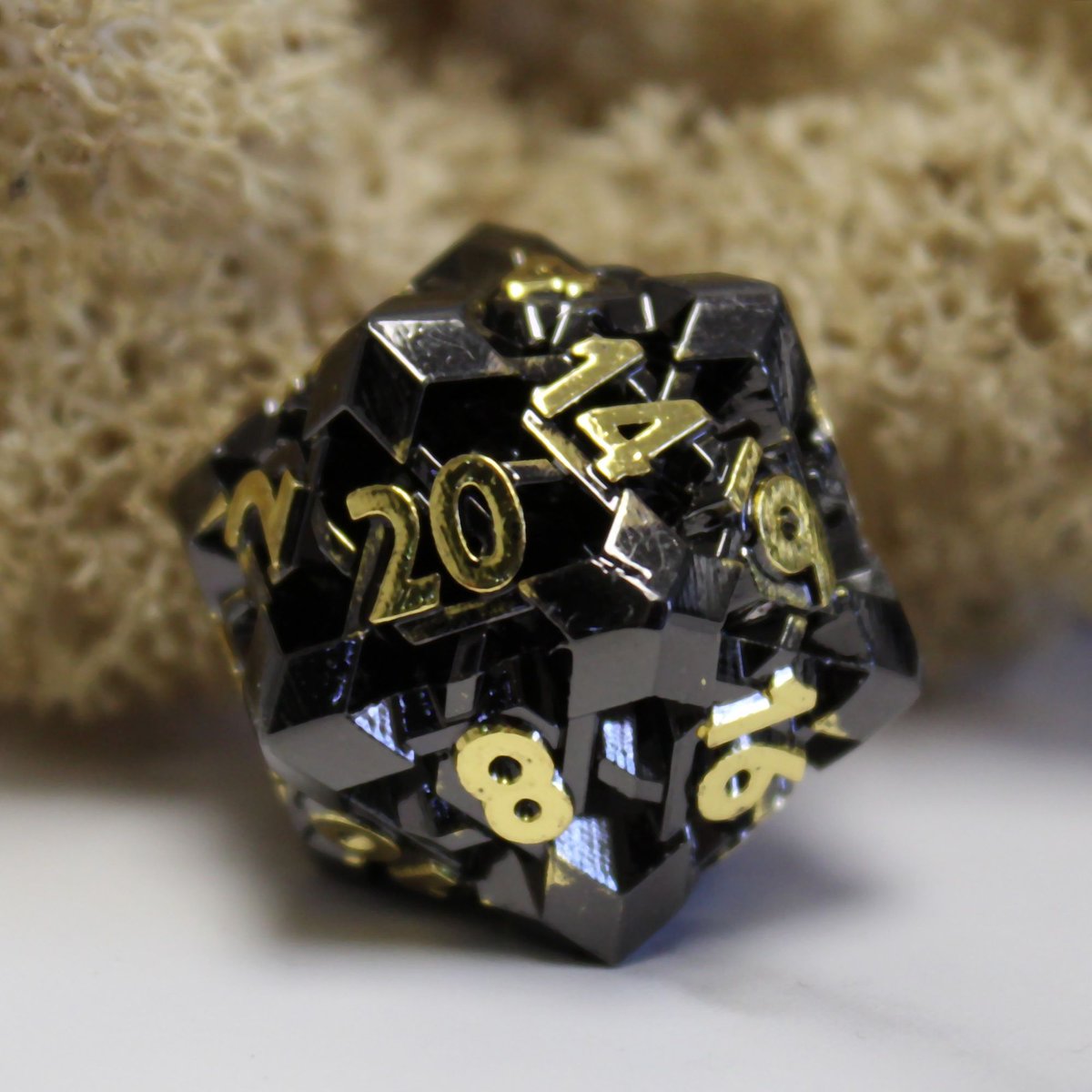New set release! Please welcome the new NightBane Set. These black nickel  dice feature a unique gold-color electroplating on the font - making them easy to read and a stylish  addition to any collection. buff.ly/3UOxvrl