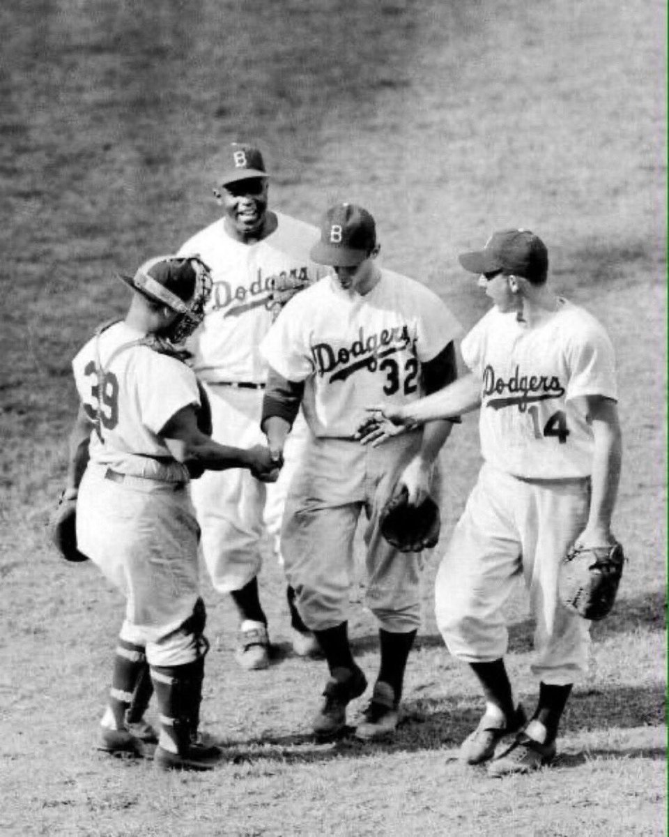 “Old Days”Dodger 19 yr old Rookie Pitcher Sandy Koufax is congratulated by some Dodger HOFers,Roy Campanella,Jackie Robinson and Gil Hodges after pitching a 2 hit shutout with 14 Strikeouts vs the Reds at Ebbets Field in 1955.#Dodgers #Brooklyn #HOF
