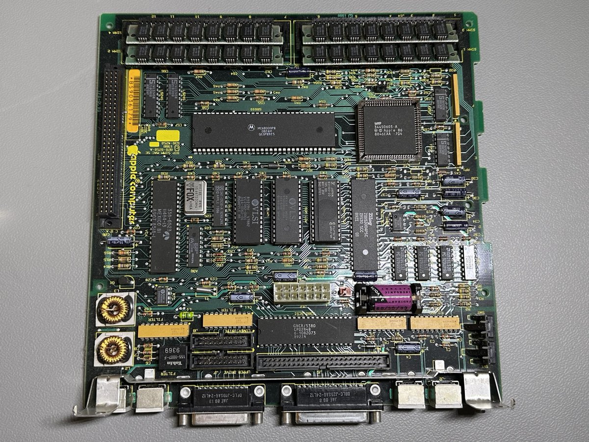 moorejh's tweet photo. Pulled the motherboard out of my Mac SE tonight. Removed the lithium battery (purple) from 1989. So fortunate this thing had not leaked. #retrocomputing #macintosh #macSE https://t.co/f0gIkvAH4Z