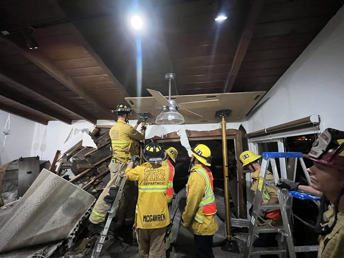 CC_Firefighters's tweet photo. .@CulverCityFD responded to a vehicle into a structure on the SB 405 at Washington Blvd off ramp earlier this evening. The vehicle fleeing from CHP blew through the guard rail and into the living room of the home below. SMFD USAR was requested to shore the compromised structure. https://t.co/jyj3cpLAVq