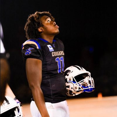 For nearly three full seasons this kid stood on the sideline and watched. In the 14 games at QB for me all he did was go
 
156 of 276 for 2,153yds
Throw 26 TDs 
Rush for 567 yds and 8 TDs 
Set the Creekside record for 6 TD passes in one game. 

That C on his chest was earned.