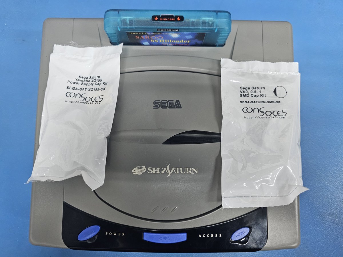 Voultar's tweet image. My friends, 

Today at 12:15PM EST, I'm conducting a Sega Saturn repair workshop! I'll be performing repairs on a "dead" Japanese VA0 launch unit with a complete recap! 

Everyone is welcome! Please come, enjoy and learn! 

youtube.com/voultar
twitch.tv/voultar